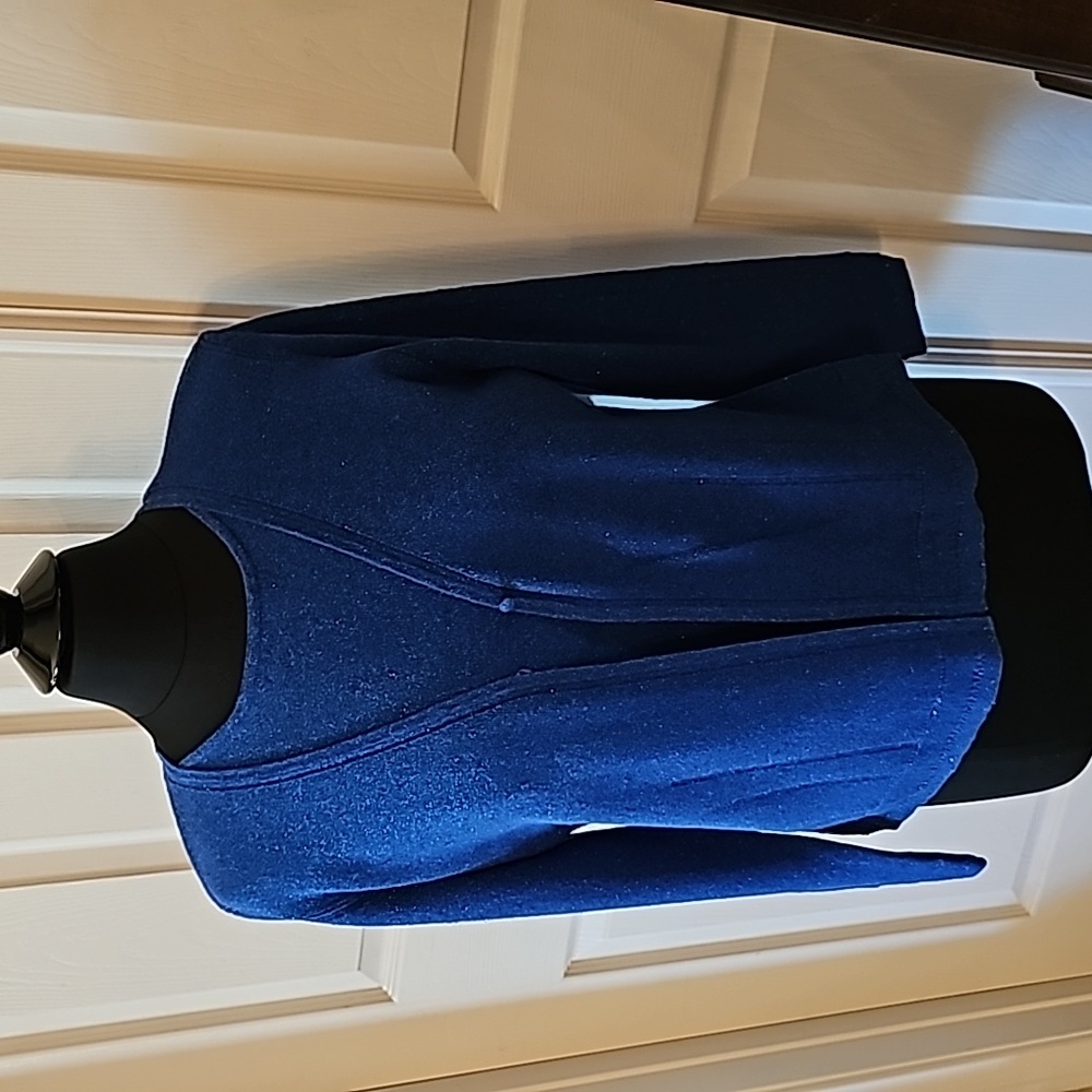 Sparkly blue sweater.